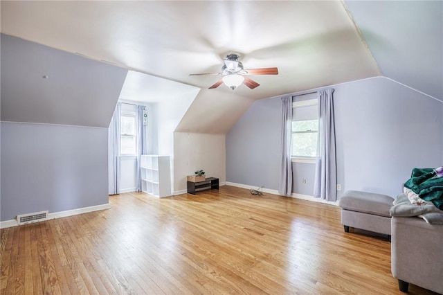 12 Queensboro Rd, Irondequoit, NY 14609 - bonus room featuring a ceiling fan, light wood-type flooring, vaulted ceiling, and baseboards