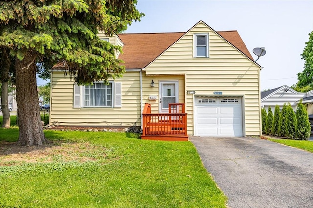 12 Queensboro Rd, Irondequoit, NY 14609 - view of front of property featuring a front yard, an attached garage, driveway, and roof with shingles