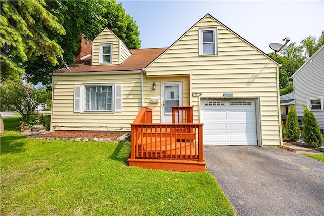 12 Queensboro Rd, Irondequoit, NY 14609 - view of front of property featuring a garage, a front lawn, and asphalt driveway
