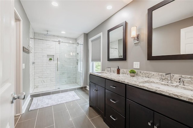 74 Broadmoor Trl, Perinton, NY 14450 - bathroom with a shower stall, double vanity, recessed lighting, tile patterned flooring, and baseboards