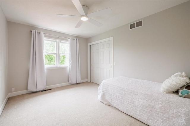 74 Broadmoor Trl, Perinton, NY 14450 - carpeted bedroom featuring baseboards, a closet, and a ceiling fan