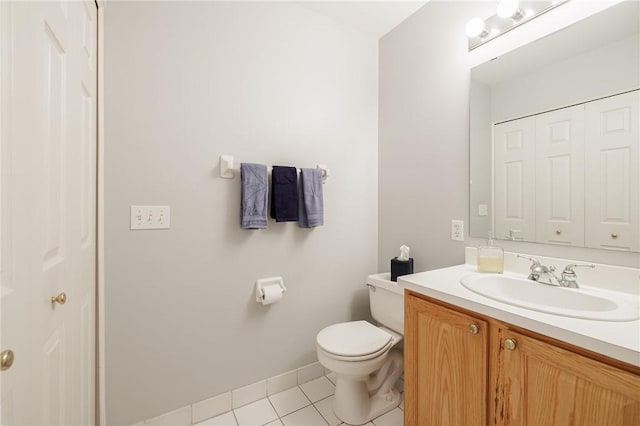 3 Legacy Oak Trl, Henrietta, NY 14534 - half bathroom with tile patterned floors, vanity, toilet, baseboards, and a closet