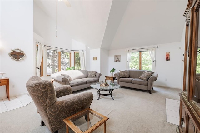 3 Legacy Oak Trl, Henrietta, NY 14534 - living area with high vaulted ceiling, light colored carpet, baseboards, and a ceiling fan