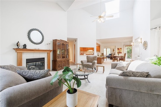3 Legacy Oak Trl, Henrietta, NY 14534 - living area with carpet, a high ceiling, a fireplace, and ceiling fan