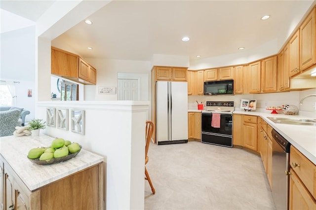 3 Legacy Oak Trl, Henrietta, NY 14534 - kitchen with range with electric cooktop, freestanding refrigerator, black microwave, stainless steel dishwasher, and a sink