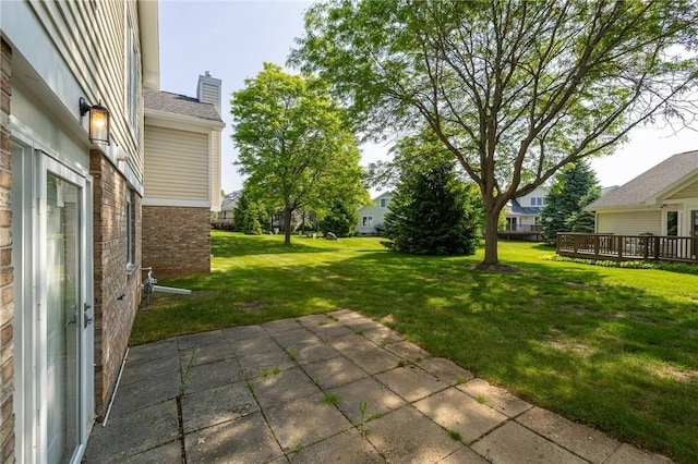 3 Legacy Oak Trl, Henrietta, NY 14534 - view of green lawn with a patio and a deck