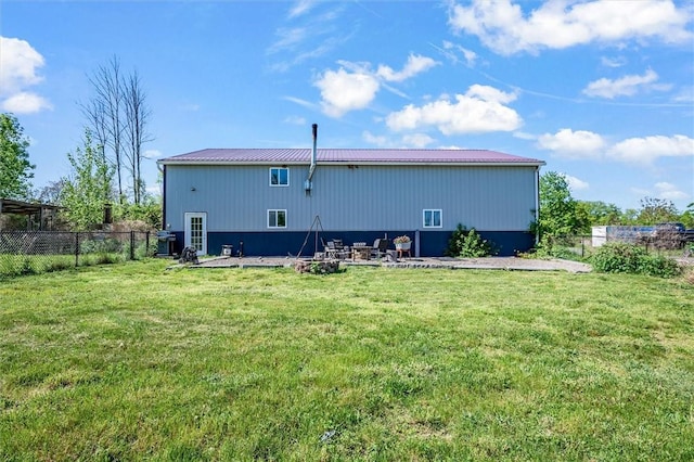 2309 Mcburney Rd, Phelps, NY 14432 - rear view of property with metal roof and an outbuilding