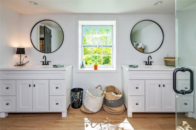 2309 Mcburney Rd, Phelps, NY 14432 - full bath with two vanities and wood finished floors