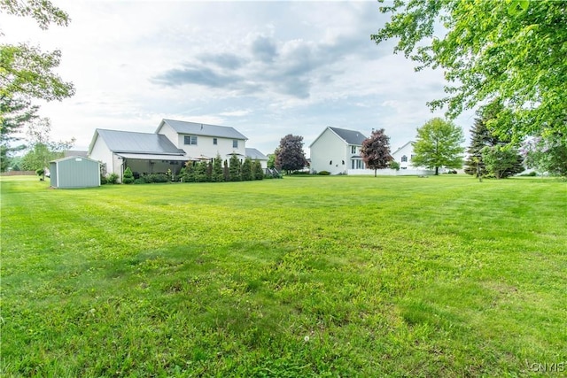 1 Carol Dr, Adams, NY 13605 - view of grassy yard featuring a shed