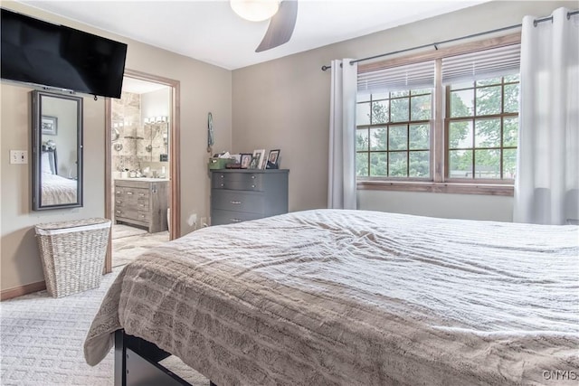 1 Carol Dr, Adams, NY 13605 - carpeted bedroom featuring a ceiling fan and ensuite bathroom
