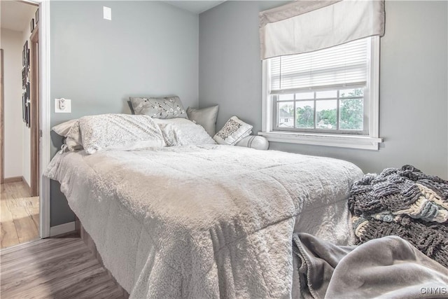 1 Carol Dr, Adams, NY 13605 - bedroom featuring wood finished floors and baseboards