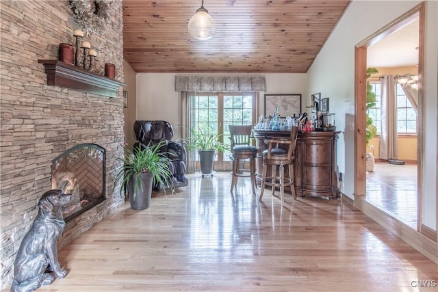 1 Carol Dr, Adams, NY 13605 - sitting room with wood finished floors, vaulted ceiling, a fireplace, and wooden ceiling