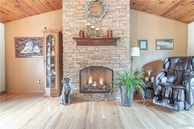 1 Carol Dr, Adams, NY 13605 - living area with lofted ceiling, wood ceiling, ornamental molding, wood-type flooring, and a fireplace