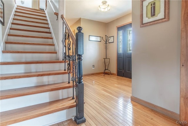 1 Carol Dr, Adams, NY 13605 - foyer entrance with stairway and light wood-style floors