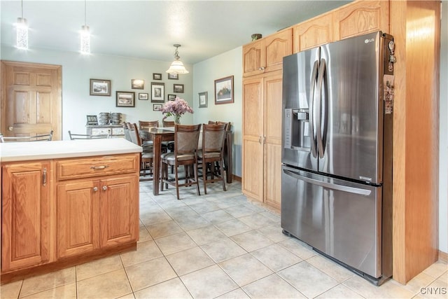 1 Carol Dr, Adams, NY 13605 - kitchen with stainless steel refrigerator with ice dispenser, light tile patterned floors, light countertops, and decorative light fixtures
