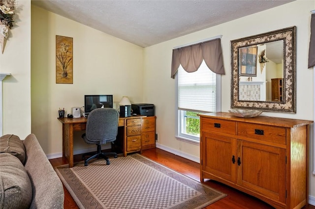 75 Red Rock Cir, Greece, NY 14626 - office area featuring dark wood-style floors, baseboards, vaulted ceiling, and a textured ceiling
