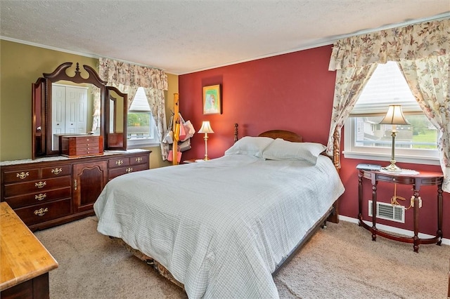75 Red Rock Cir, Greece, NY 14626 - carpeted bedroom with a textured ceiling and baseboards