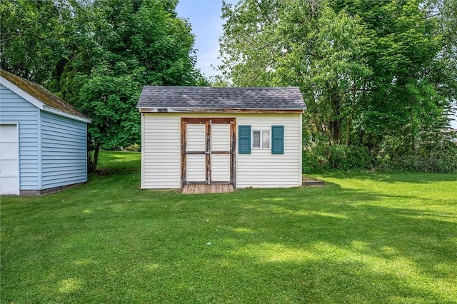 75 Red Rock Cir, Greece, NY 14626 - view of shed featuring a garage
