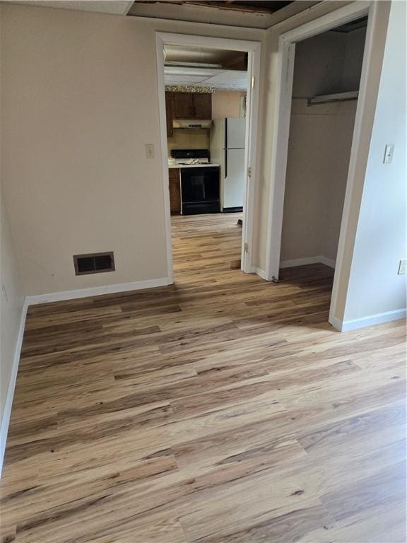95 Wadsworth Ave, Avon, NY 14414 - hall with light wood-type flooring and baseboards