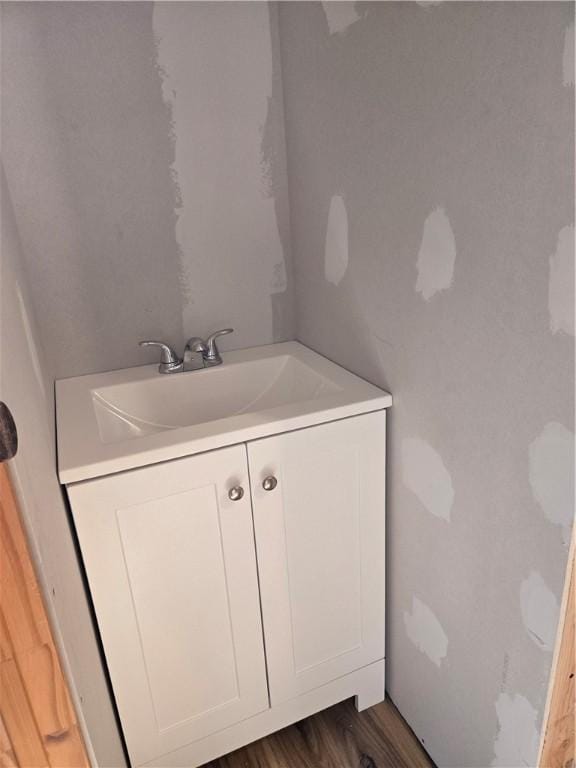 95 Wadsworth Ave, Avon, NY 14414 - bathroom with vanity and wood finished floors