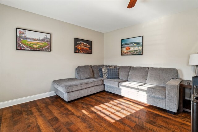 102 Trolley Line Rd, Hartwick, NY 13326 - living room featuring a ceiling fan, baseboards, and dark wood finished floors