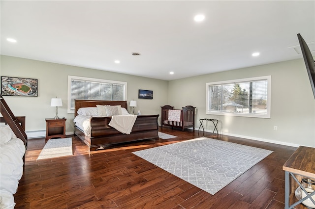 102 Trolley Line Rd, Hartwick, NY 13326 - bedroom featuring a baseboard heating unit, wood finished floors, recessed lighting, and baseboards