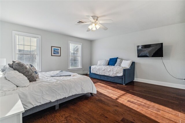 102 Trolley Line Rd, Hartwick, NY 13326 - bedroom with dark wood-style flooring, baseboards, and ceiling fan
