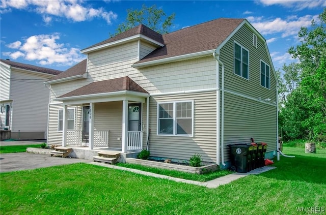 1806 Como Park Blvd, Lancaster, NY 14086 - view of front facade featuring a front lawn and roof with shingles