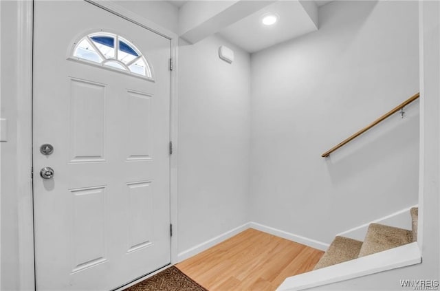 1806 Como Park Blvd, Lancaster, NY 14086 - entryway featuring light wood-type flooring, stairs, baseboards, and recessed lighting