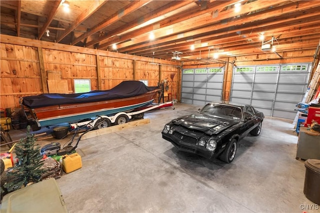 55 Redmond Rd, Trenton, NY 13304 - garage featuring a garage door opener