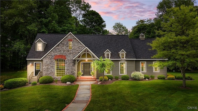55 Redmond Rd, Trenton, NY 13304 - view of front of house featuring a front yard and stone siding