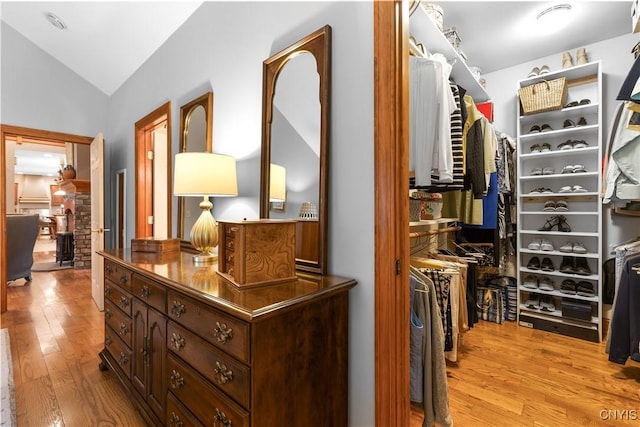 55 Redmond Rd, Trenton, NY 13304 - walk in closet with lofted ceiling and wood finished floors