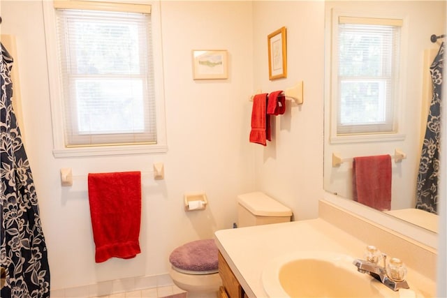 179 Kentucky Xing, Greece, NY 14612 - bathroom with toilet, vanity, and a shower with curtain