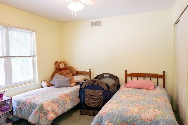 179 Kentucky Xing, Greece, NY 14612 - bedroom with carpet floors, a closet, and ceiling fan