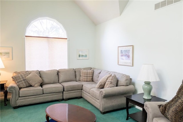 179 Kentucky Xing, Greece, NY 14612 - living room featuring carpet floors and lofted ceiling