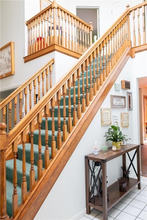 179 Kentucky Xing, Greece, NY 14612 - stairs with a high ceiling and tile patterned floors