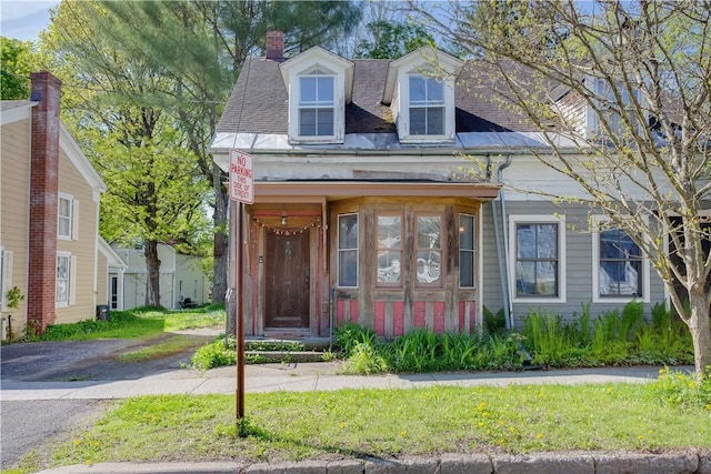 59 Elm St, Otsego, NY 13326 - view of front of house featuring a chimney and a shingled roof