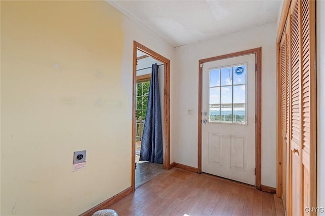 6669 Rottamore Rd, Stockbridge, NY 13409 - foyer entrance featuring light wood finished floors and baseboards