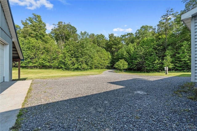 6669 Rottamore Rd, Stockbridge, NY 13409 - view of green lawn with a wooded view