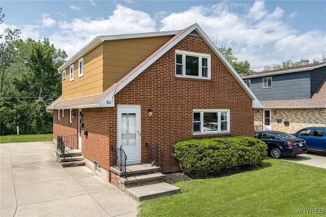 51 N Seine Dr Unit 1 & 2, Cheektowaga, NY 14227 - view of front of property with brick siding and a front yard