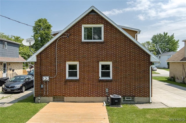 51 N Seine Dr Unit 1 & 2, Cheektowaga, NY 14227 - view of side of property featuring brick siding and central AC unit