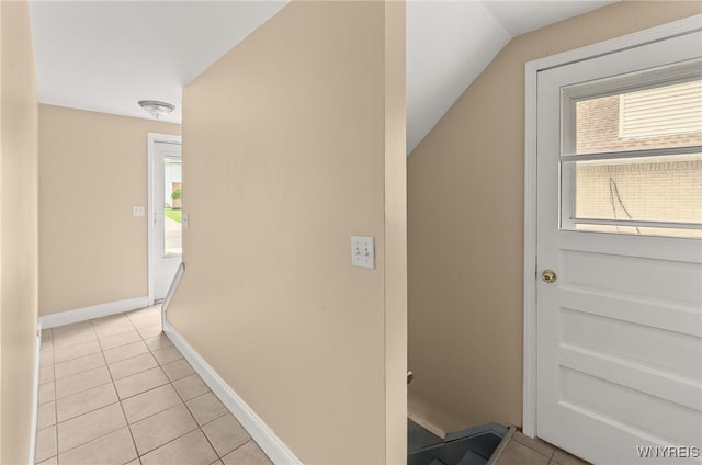51 N Seine Dr Unit 1 & 2, Cheektowaga, NY 14227 - corridor with light tile patterned floors, vaulted ceiling, and baseboards