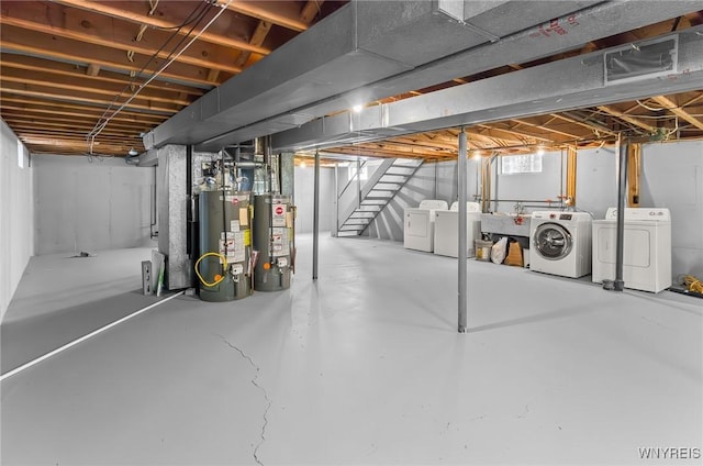 51 N Seine Dr Unit 1 & 2, Cheektowaga, NY 14227 - basement with washing machine and clothes dryer, gas water heater, and stairs