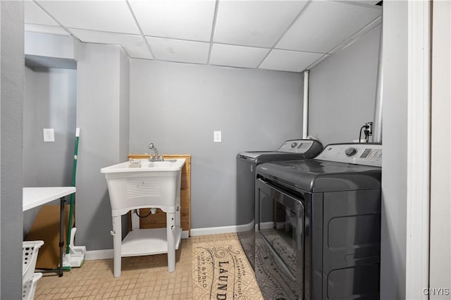 3477 Mcclary Rd, Lafayette, NY 13084 - laundry room featuring washing machine and dryer and baseboards