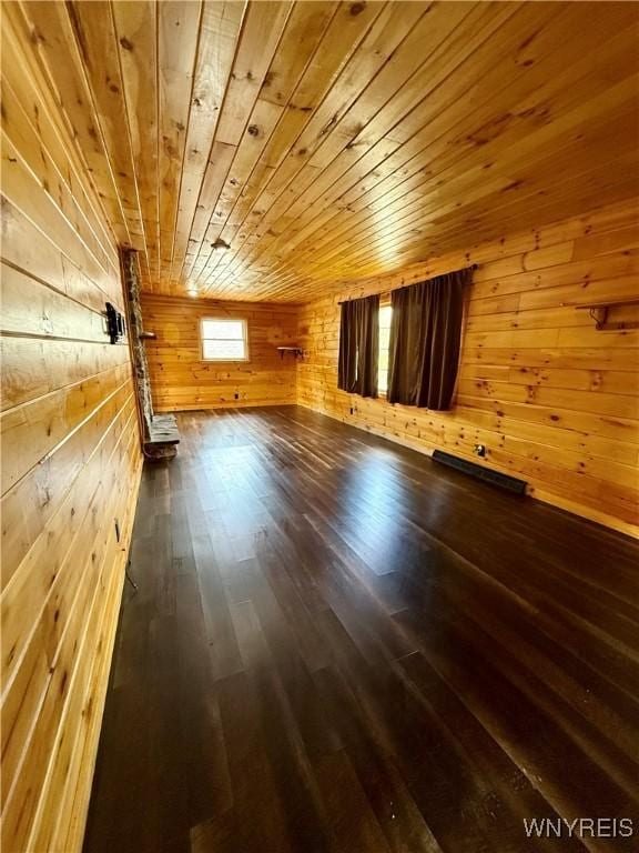 3394 Pike Rd, Alexander, NY 14020 - unfurnished room featuring wooden walls, wood ceiling, and hardwood / wood-style flooring