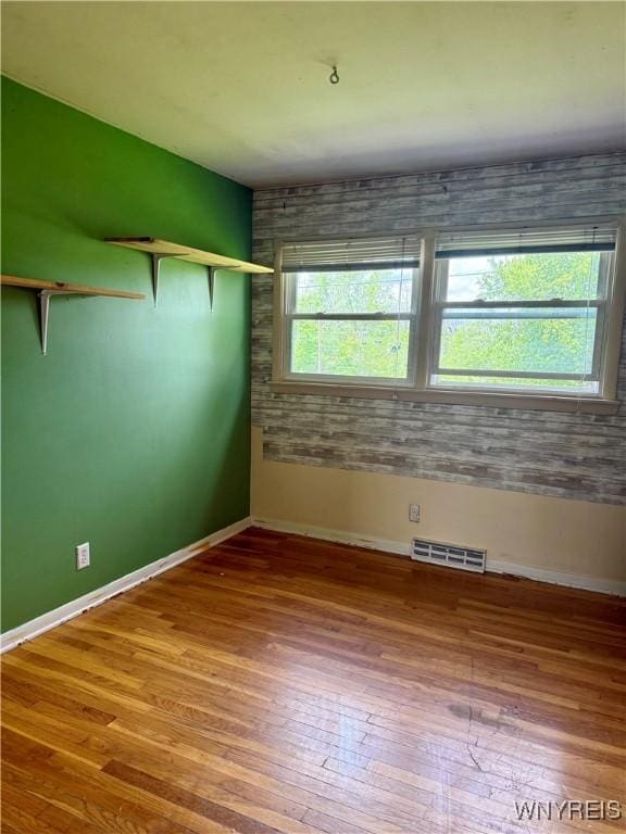 3394 Pike Rd, Alexander, NY 14020 - spare room featuring hardwood / wood-style flooring and baseboards