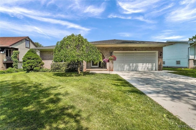 61 Caesar Blvd, Amherst, NY 14221 - view of front of home with brick siding, concrete driveway, and a garage