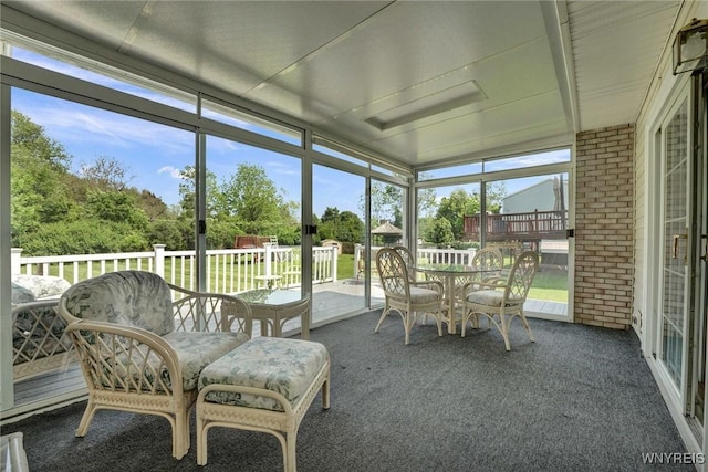 61 Caesar Blvd, Amherst, NY 14221 - sunroom / solarium with outdoor dining area