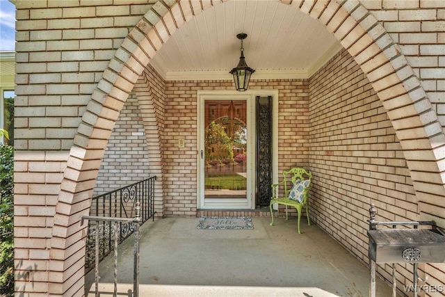 61 Caesar Blvd, Amherst, NY 14221 - entrance to property with brick siding and a porch