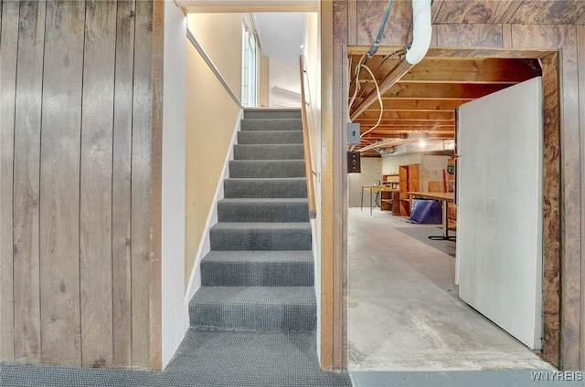 61 Caesar Blvd, Amherst, NY 14221 - staircase featuring unfinished concrete flooring